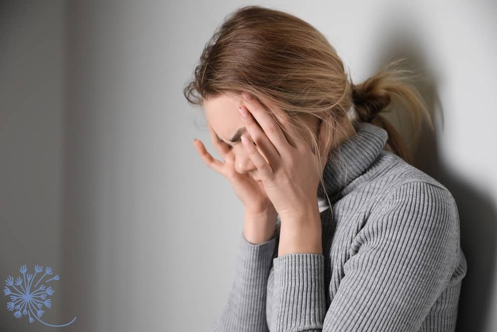 Distressed woman struggling with purging
